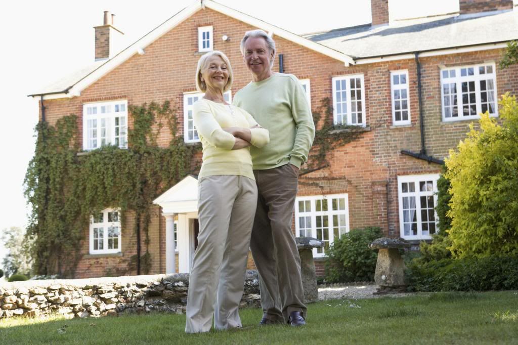 Retired couple in yard