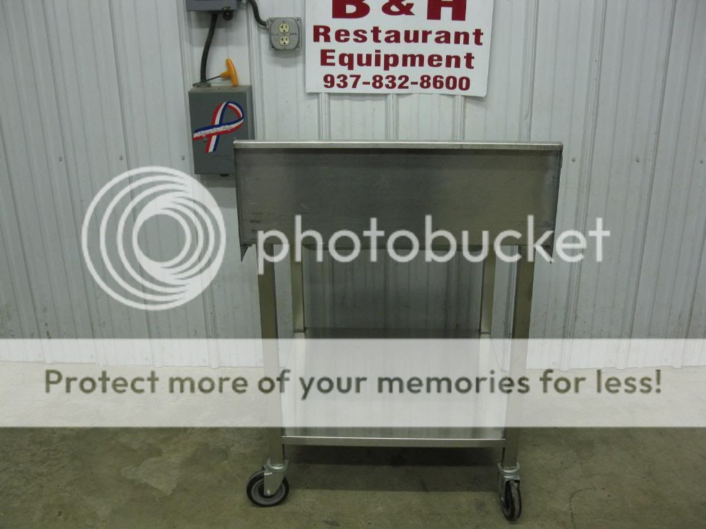 You are looking at an Amtekco stainless steel chicken breading table.